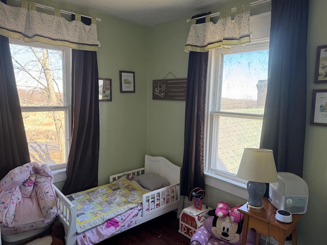 bedroom featuring hardwood / wood-style floors