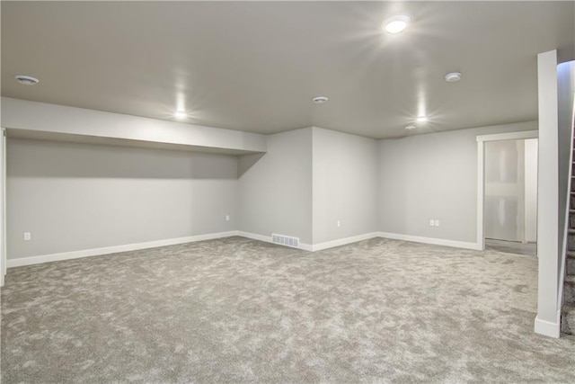 basement featuring carpet