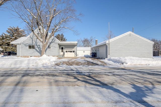 view of front of property with a carport