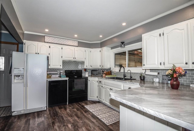 kitchen with sink, white cabinetry, electric range, dark hardwood / wood-style floors, and white refrigerator with ice dispenser