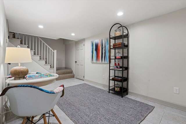 living area with light tile patterned floors