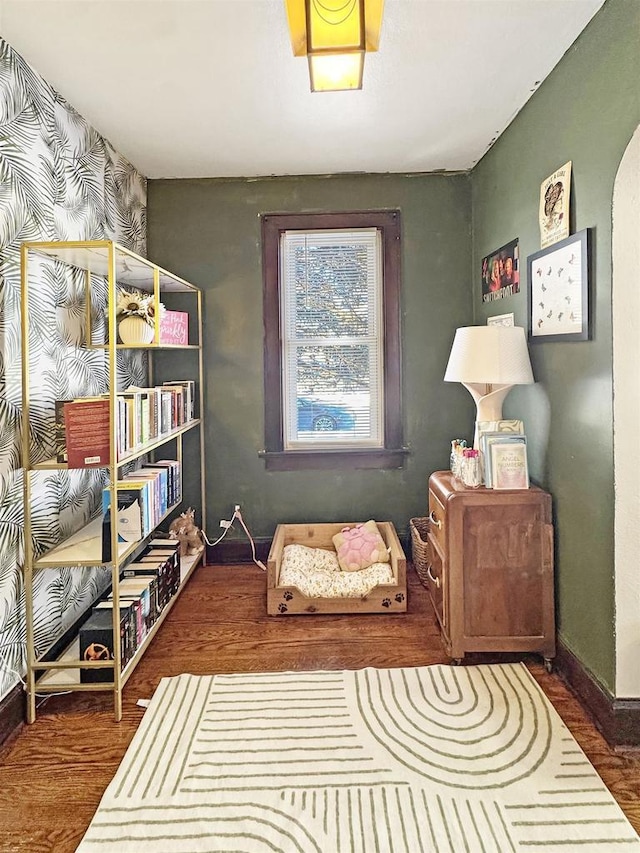 living area with dark wood-type flooring