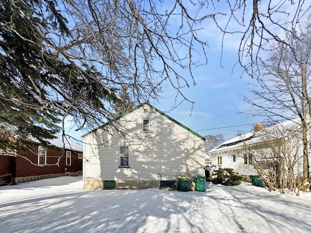 view of snow covered property