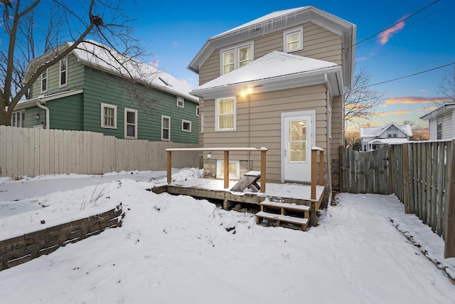 view of snow covered property