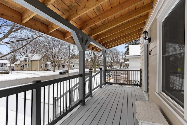 view of snow covered deck