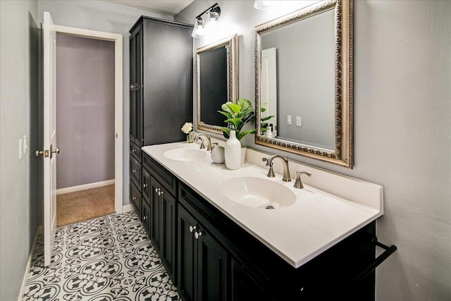 bathroom with vanity and tile patterned floors