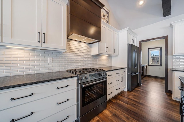 kitchen with lofted ceiling, stainless steel appliances, custom exhaust hood, and white cabinets