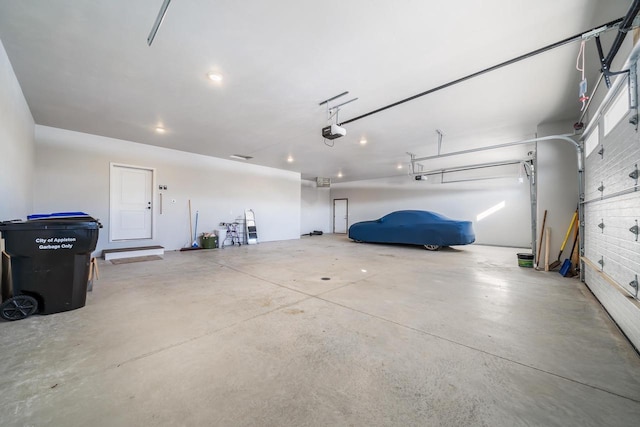 garage featuring a garage door opener