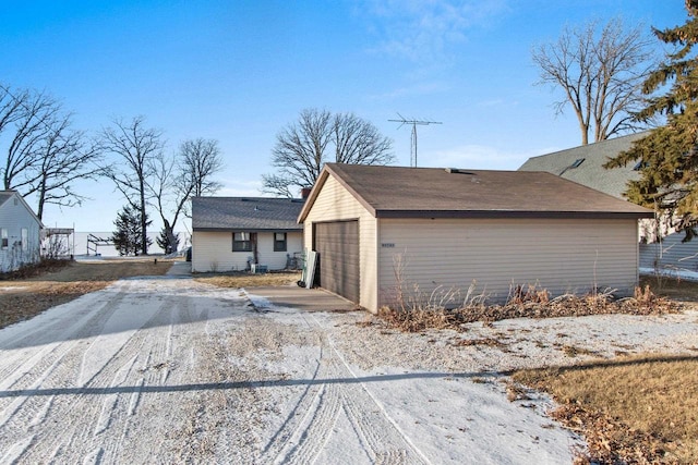 N9549 Bay Shore Ln, Luxemburg, WI 54217 - view of side of home featuring a garage