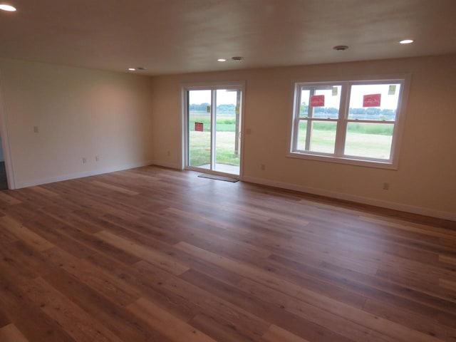 127 Linden Ln, Fox Lake, WI 53933 - empty room featuring wood finished floors and recessed lighting
