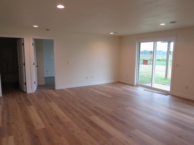 127 Linden Ln, Fox Lake, WI 53933 - unfurnished room featuring recessed lighting and light wood finished floors