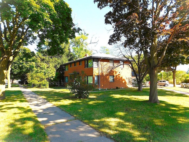 exterior space with a front lawn