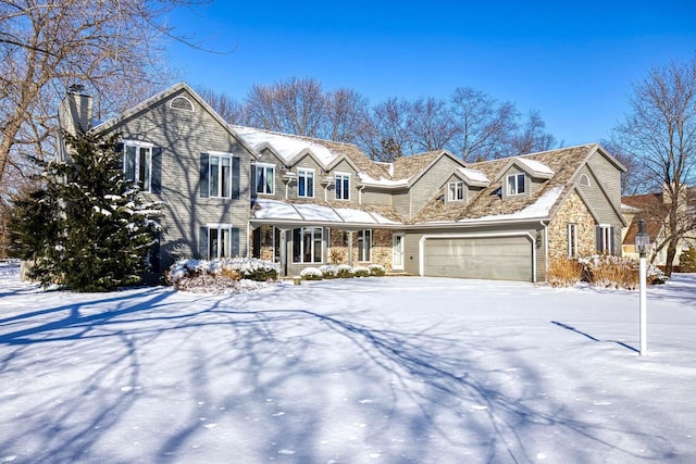 view of front of property featuring a garage