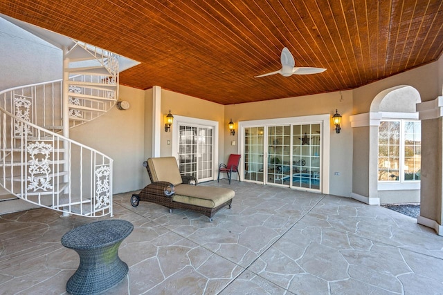 view of patio featuring ceiling fan