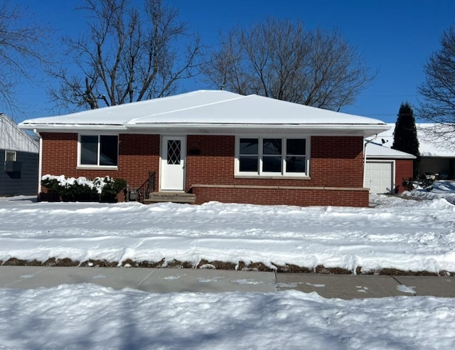 view of front of home with an outbuilding and a garage