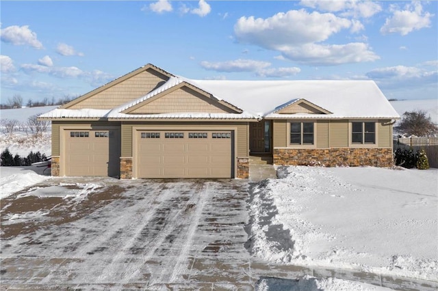 single story home featuring a garage