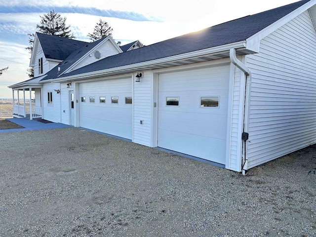 garage with covered porch