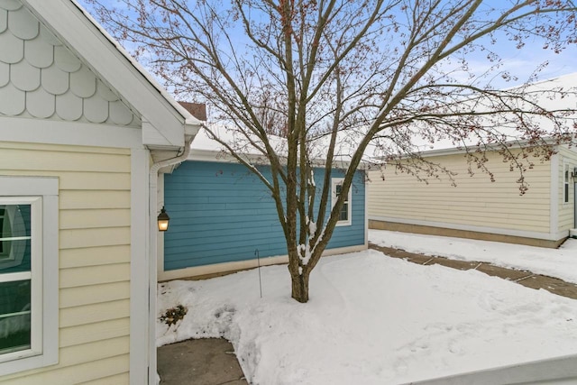 view of snow covered property