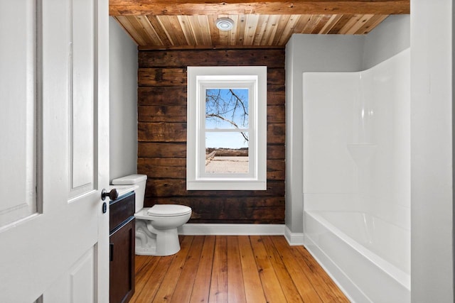 full bathroom featuring hardwood / wood-style flooring, tub / shower combination, vanity, wooden ceiling, and toilet