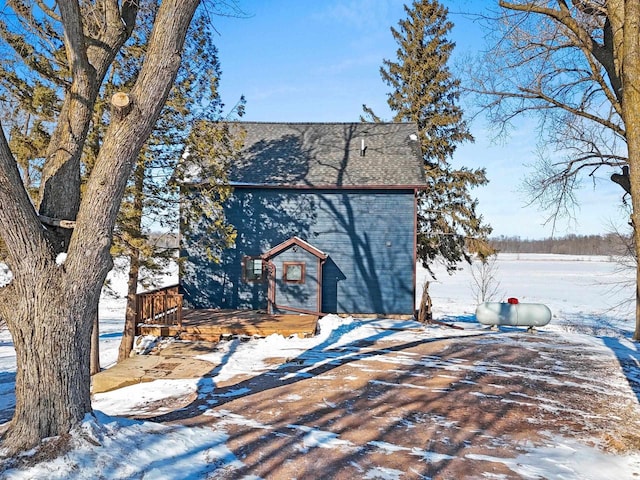 view of front facade featuring a wooden deck