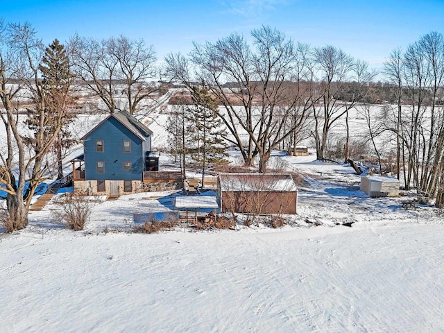 view of yard covered in snow