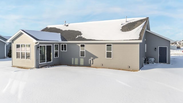 view of snow covered property