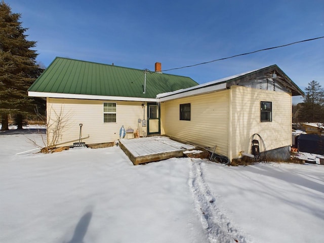 view of snow covered property