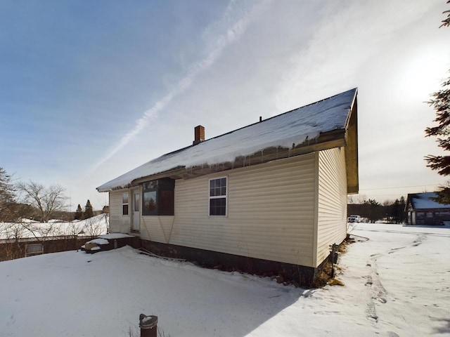 3675 Flanner Ln, Laona, WI 54541 - view of snow covered exterior