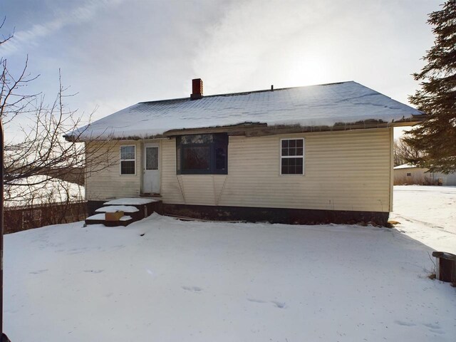 3675 Flanner Ln, Laona, WI 54541 - view of snow covered back of property
