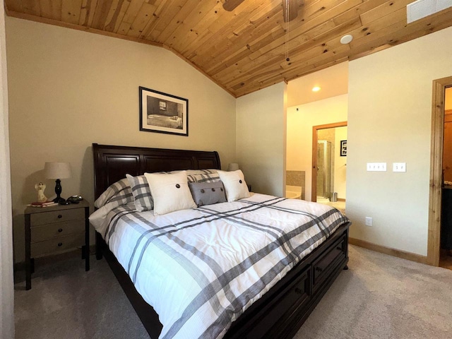 bedroom featuring lofted ceiling, connected bathroom, carpet floors, and wooden ceiling