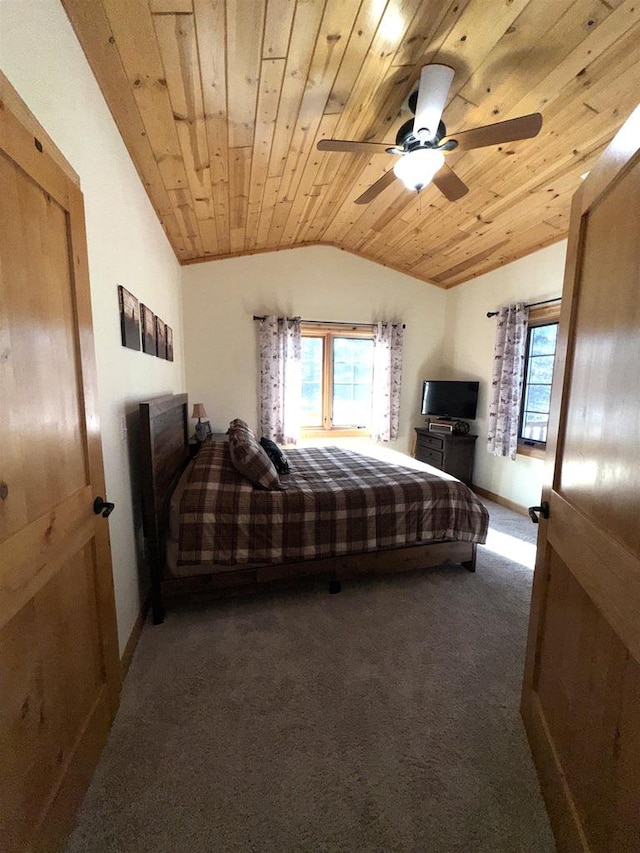 bedroom featuring wood ceiling, vaulted ceiling, ceiling fan, and carpet flooring