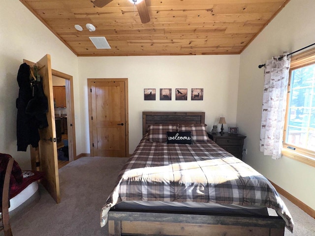 carpeted bedroom with vaulted ceiling and wooden ceiling