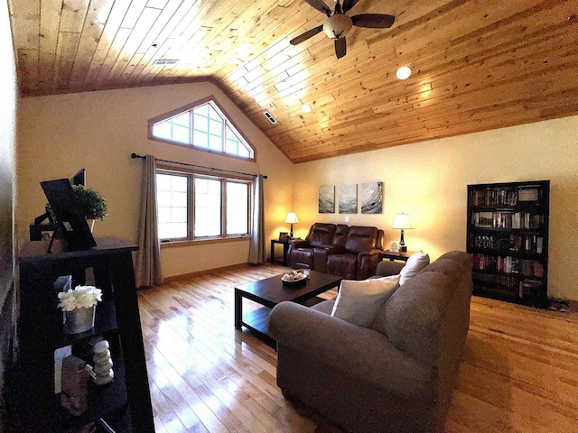 living room featuring vaulted ceiling, ceiling fan, wood ceiling, and light hardwood / wood-style flooring