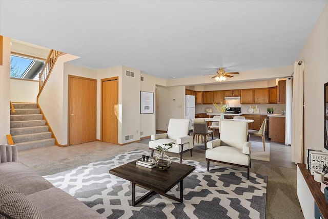 living room with ceiling fan