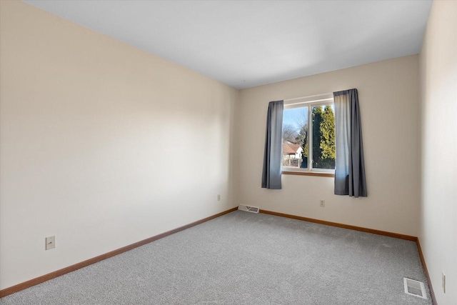 view of carpeted spare room