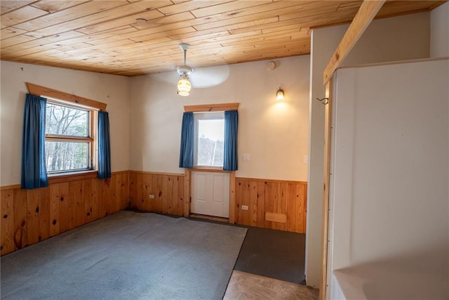 15035W Goss Rd, Hayward, WI 54843 - empty room with carpet flooring, wooden ceiling, and wooden walls