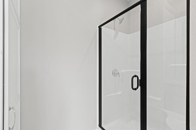 bathroom with an enclosed shower