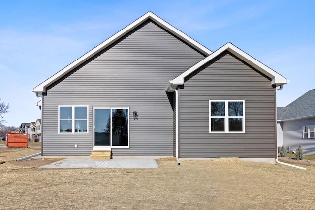 rear view of property with a patio area