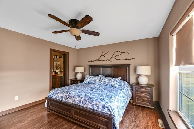 bedroom with ceiling fan and dark hardwood / wood-style floors
