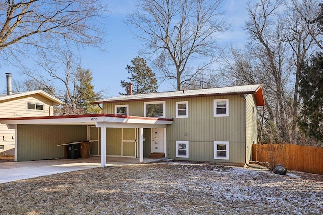 view of front facade with a carport