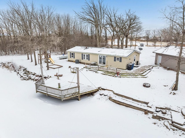 view of snow covered property