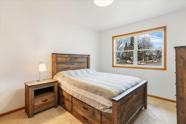 bedroom featuring light colored carpet