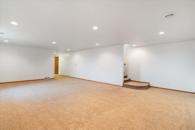 spare room with carpet floors