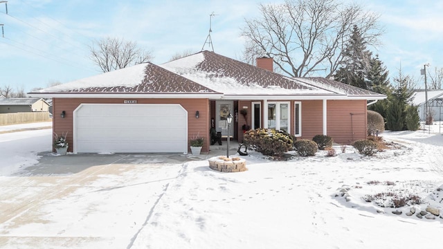 ranch-style home with a garage