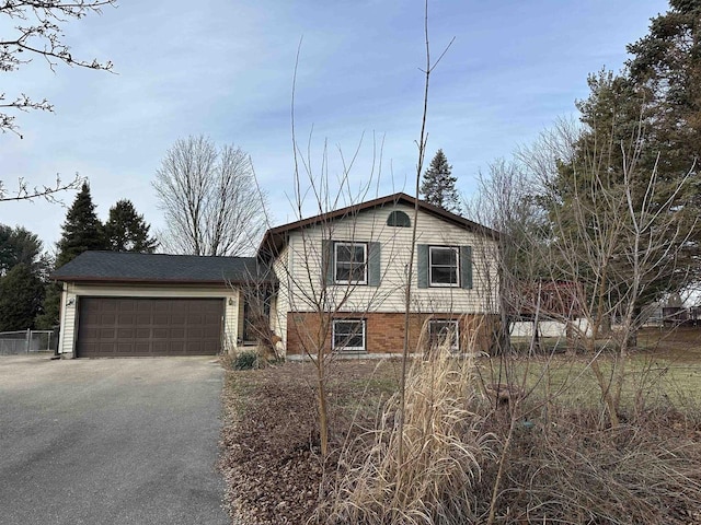 tri-level home featuring a garage