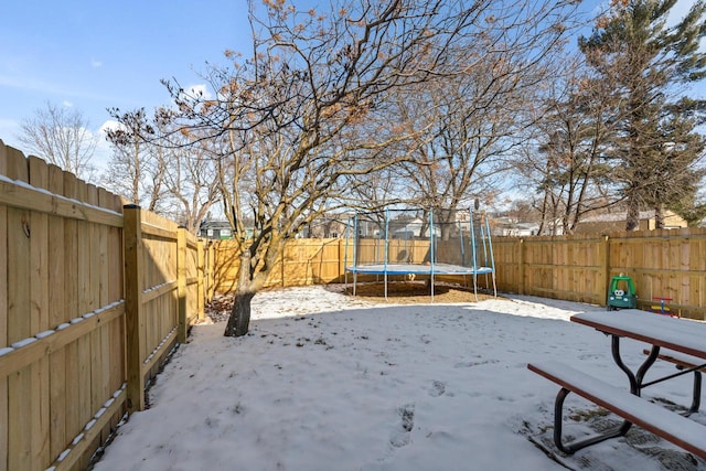 429 W Juneau St, Tomah, WI 54660 - snowy yard with a trampoline