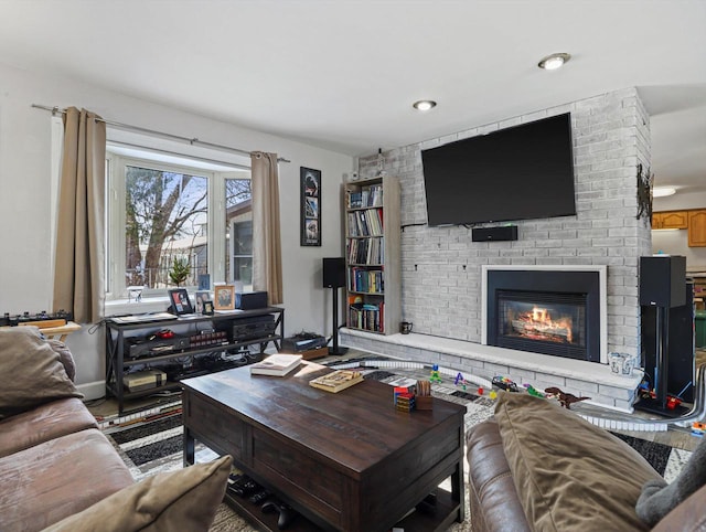 living room featuring a fireplace