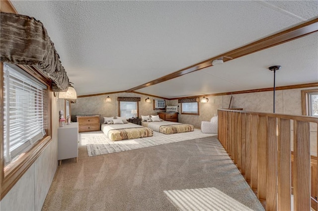 unfurnished bedroom featuring a textured ceiling, light carpet, vaulted ceiling, multiple windows, and crown molding