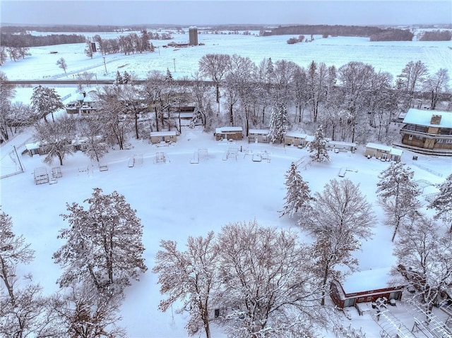 snowy aerial view with a rural view