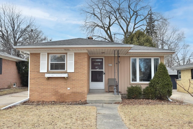 bungalow with a front yard